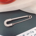 Elegant rose gold safety pin brooch with shimmering rhinestones for stylish women - Sparkling Gold Pin