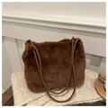 Detail of brown faux fur tote bag showing plush texture and leather shoulder strap - Brown Without Pendant