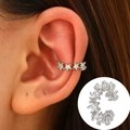 Silver star ear cuff with clear cubic zirconia crystals in a minimalist non-pierced design - White K - Pentagram Shape (2012)