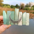 Detail of bohemian moon hair clip with green aventurine crystals and silver wire wrap - Green Aventurine + Moon