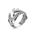 Detailed macro view of the vintage tribal flame carving on an oxidized silver open ring - Vintage Carved