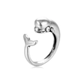 Detail of vintage silver dolphin open ring showing intricate metallic texture and animal shape - Vintage Dolphin