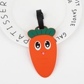 Carrot shape silicone luggage tag in orange with green leaf and black strap - Carrot