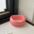 Glossy vibrant pink resin bangle bracelet with wide minimalist rounded design - Solid Pink