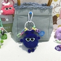 Porte-clés monstre en peluche bleu avec lunettes de soleil sur sac en jean - Bleu royal