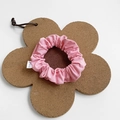 Pink fabric oversized scrunchie placed on a flower cork mat for ponytail hair styling - Small / Pink