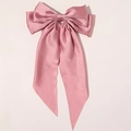 Elegante pinza de pelo con lazo de satén rosa para mujer con acabado brillante y fondo liso - Rosa