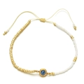 Detail of adjustable beaded bracelet with blue zircon stone and gold-white beads - Sky Blue