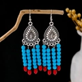 Bohemian silver earrings with blue and red bead tassels hanging on a natural branch - Silver + Red Blue Beads Tassel (E5833-2/Blue)