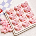 Macro detail of iridescent pink butterfly resin beads for DIY jewelry and phone chain crafts - 24*18mm / Pink