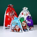 Set of colorful Christmas drawstring gift bags in red, blue, green and purple colors - Christmas Gift Bag Set