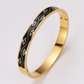 Goldenes Emaille-Armband mit bösem Blick Motiv und Klappverschluss aus Edelstahl - Schwarze Emaille