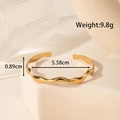 Adjustable golden wave stainless steel cuff bracelet with 5.58cm inner diameter and 0.89cm width - Wave Line Style (YB-204)