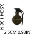 Détail d'un écusson brodé de grenade verte avec dimensions en centimètres et pouces - Style de Grenade (1)