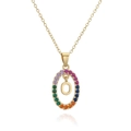 Detailed close-up of gold letter O pendant necklace with rainbow zirconia stone setting - Letter O