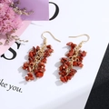 Handmade gold tassel earrings with vibrant red natural crushed crystal stones - Gold Hook Style / Red Stone