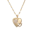 18K gold plated necklace featuring a heart pendant with cubic zirconia on white background - Gold