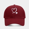Close-up of heart embroidery on burgundy cotton baseball cap with twill texture detail - Adjustable / Burgundy