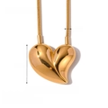 Exaggerated 18K gold stainless steel heart pendant necklace for women on white background - Necklace / Gold Heart Pendant Necklace (JDN2306025)