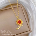 Macro shot of gold rose necklace with red gemstone and crystal detail, 4.9g weight - Rose Flower Necklace (P533)