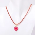 Goudkleurige tennis ketting met roze hartvormige hanger en fonkelende zirkonia - Rozerood