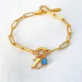 14K goud vergulde roestvrijstalen armband met letter Z en blauwe bedeltje - Letter Z / Staalkleur