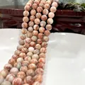 Polished natural red agate beads with white marble texture on a wooden stand - Red Network Stone 26 / 6mm / Approx 63pcs