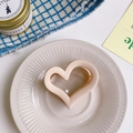 Matte beige heart-shaped claw clip for women on a ceramic plate with a plaid fabric - Approx 6.5cm / Apricot Heart