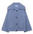 Detailed view of blue and brown checkered knit cardigan with lapel and dark buttons - S / Blue