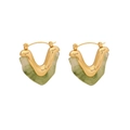 Golden V-shaped hoop earrings with green marbled resin inlay on a clean white background - Green