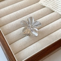 Vintage silver flower ring with brushed metal texture on a beige jewelry display - 42# Silver Brushed Texture Five-Petal Flower Open Ring