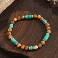 Handmade beaded bracelet with natural turquoise and brown stones on wood background - ZJ14956-Natural Stone Turquoise Metal Spacer Bead Bracelet