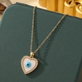 Golden heart necklace with devil eye pendant and mother-of-pearl on a green box - A12-Gold
