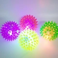 Set of four colorful high-elastic LED flashing massage balls for dogs in various colors - 6.5cm LED Flashing Spiky Ball