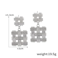 Zilveren vierkante oorknopjes met geweven textuur en dubbellaags metalen ontwerp - Geometrische Geweven Stijl / Zilver