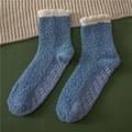 Detail of blue coral fleece socks with white cuffs and non-slip grippers on the sole - One Size / Denim Blue with Grippers