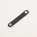 Organisateur de câbles en cuir noir avec texture litchi et bouton pression argenté - Noir