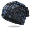 Detail van tie-dye patroon en distressed gaten op de gebreide stof van de beanie - Marineblauw