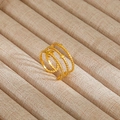 Detail of gold spiral ring with beaded texture and moon star accents on a display - Multi-Layer Star Moon Bead Style (33)