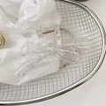 Elegant transparent bow hair claw with white lace embroidery in a metal basket - Lace Bow Claw Clip / White