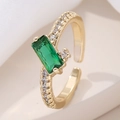 Macro view of 18K gold plated ring with emerald green zircon and micro-pave crystals - Adjustable Open / Green