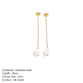 Macro detail of 14k gold plated stainless steel long chain earrings with pearl pendants - Pearl Tassel Earrings(YE15535) / Gold