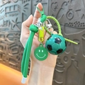 Cute green football keychain with woven rope and smiley face charm for bags - Green