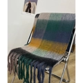 Rainbow plaid scarf in deep blue and green hues draped on a modern chrome chair - Gray Green Purple