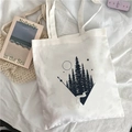 White canvas tote bag featuring minimalist black forest and moon geometric graphic art - Geometric Art Nature