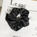 Elegant black satin oversized scrunchie with smooth silk-like texture and pleated design - Satin Premium Black