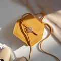 Minimalist ginger yellow hexagonal crossbody bag with premium litchi grain texture - Yellow