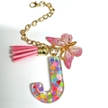Pink resin letter J keychain with butterfly charm and golden tassel for Stanley cups - Letter J