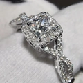 Princess cut halo twist band ring in white gold finish with pavé set diamonds - US 5 / White