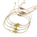 Set of four beige woven religious bracelets with gold cross and faux pearl charms - Cross Pearl 4-Piece Set